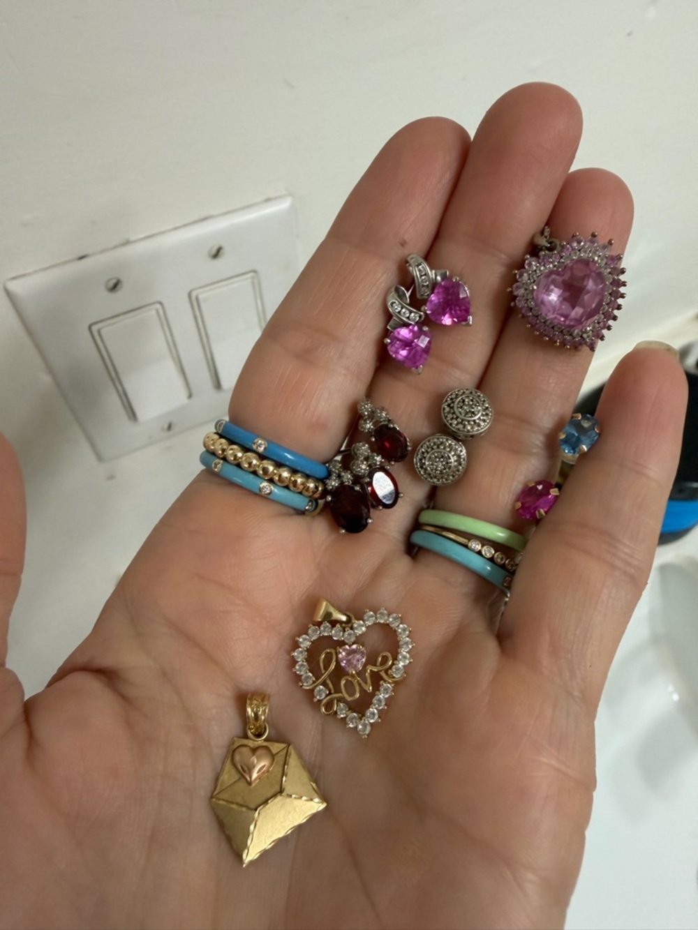 Assorted Gold and Silver earrings and Charms